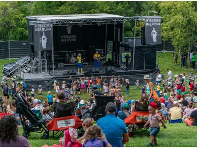 Stage at the Peterborough Folk Festival with large crowd